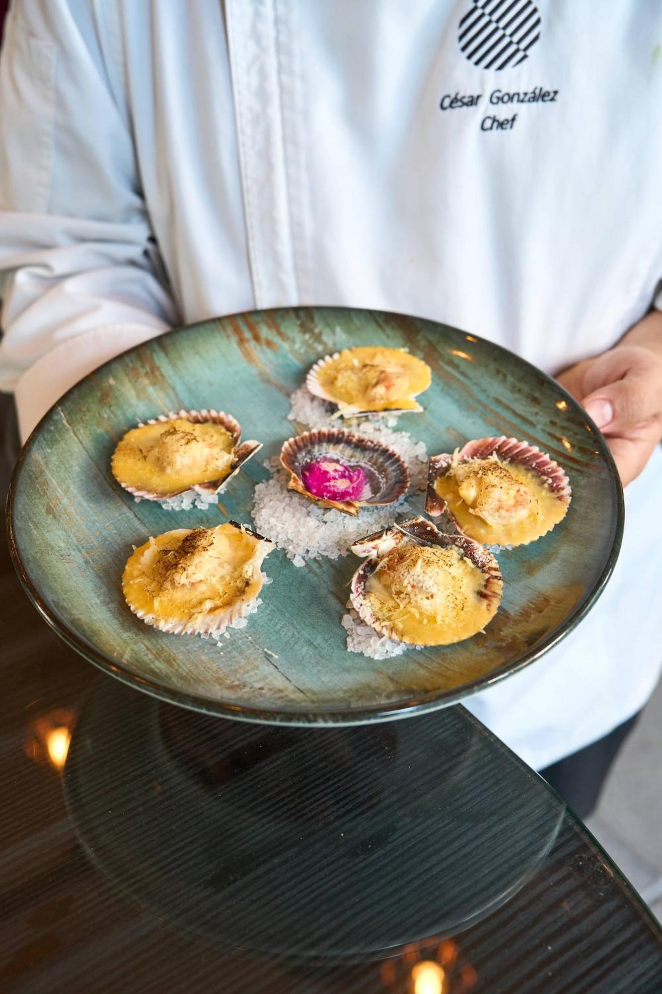Pullman Santiago Vitacura Экстерьер фото A plate of cooked scallops